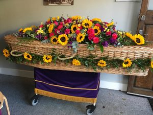 Sunflowers Tribute on a Woven Coffin