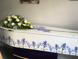Bespoke Coffin with floral tribute supplied by Albert Parr in Beckenham